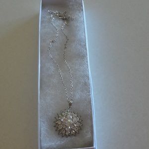 Necklace with diamond like gems in cluster